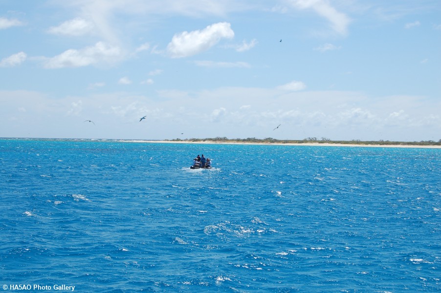 First group heads to shore to find a landing site