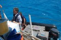 Steve with a Zodiac full of Radios going ashore